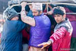 people packed in a truck